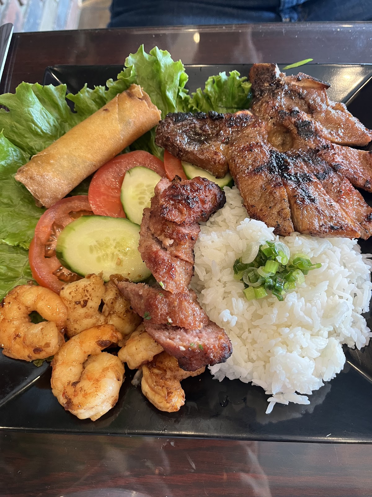 A grilled combination plate with pork, shrimp and rice at Phở Road 68