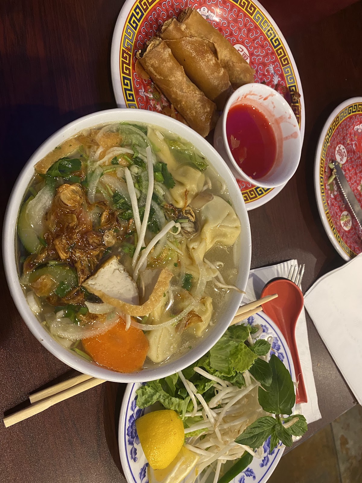 A steaming bowl of noodle soup
